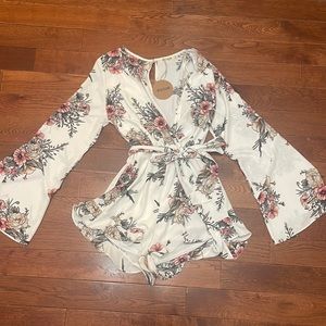 Floral belle sleeve romper